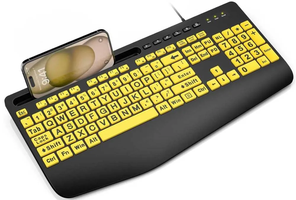 Teclado con cable y teclas amarillas de letra grande con reposamuñecas